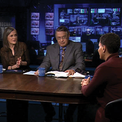 Amy Goodman and Juan Gonzalez interviewing a woman. Links to Donor-Advised Funds