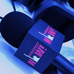 Democracy Now microphone. Links to Beneficiary Designations
